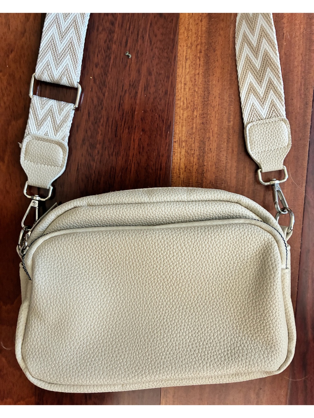 Cream Textured Crossbody Bag with Chevron Strap. EUC